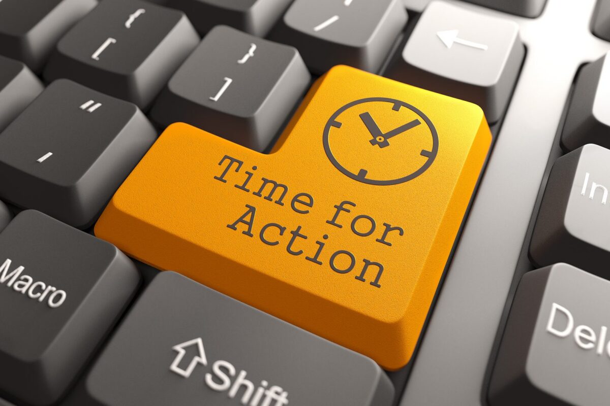 Keyboard key with words "Time for Action"