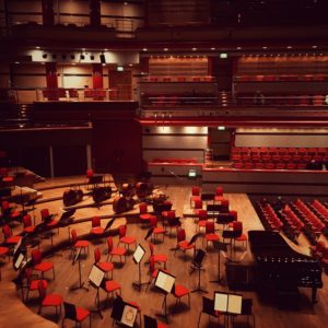 An orchestra hall before any audience or performers arrive.