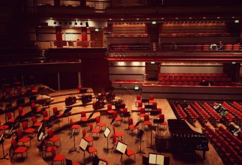 An orchestra hall before any audience or performers arrive.