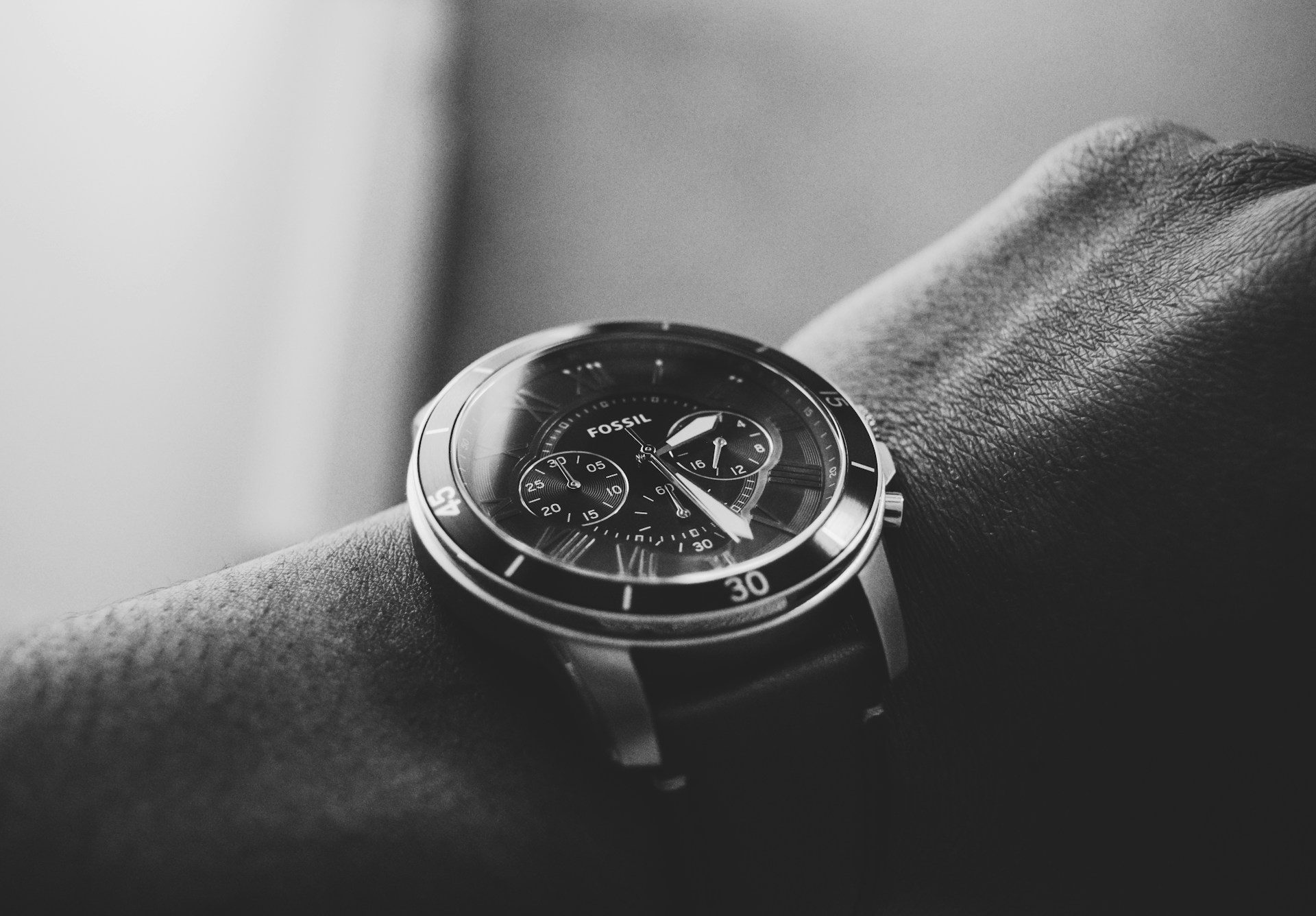 Man's wristwatch on arm