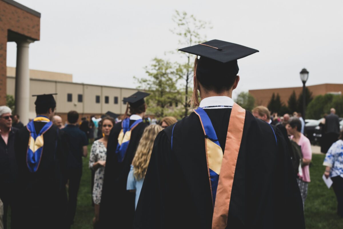 Graduates walking after ceremony